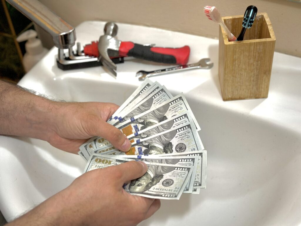 Plumber counting money