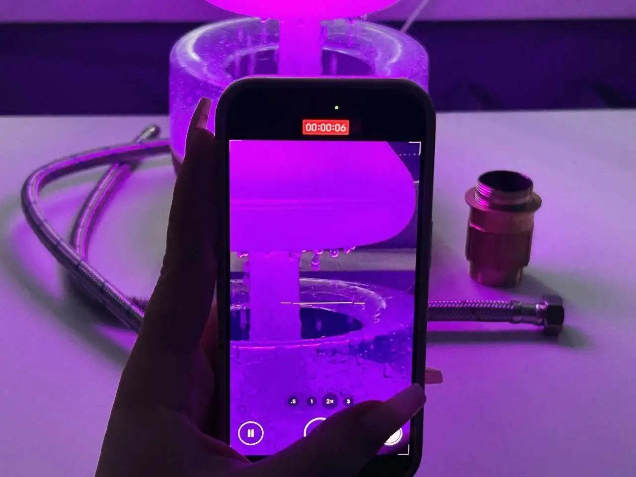 a hand taking a video