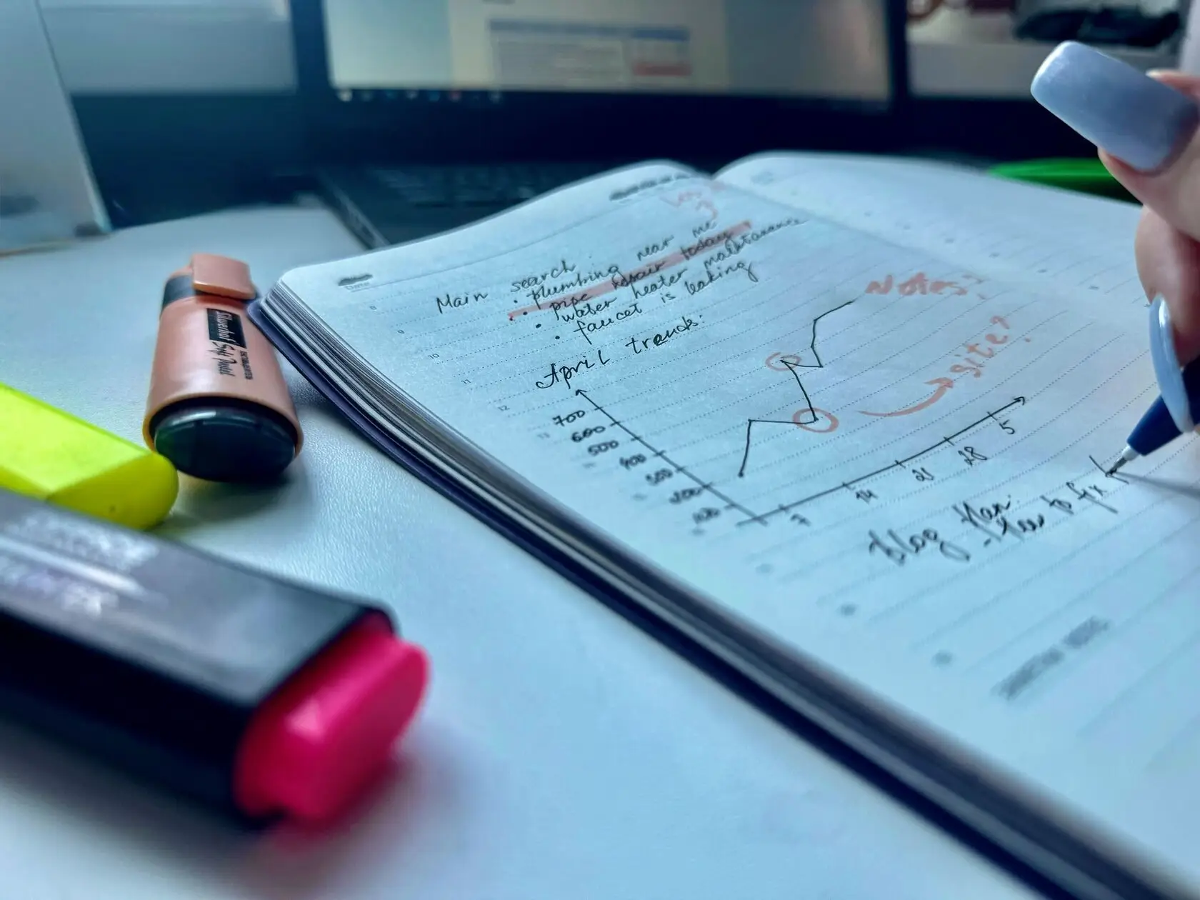 a notebook with statistics graph