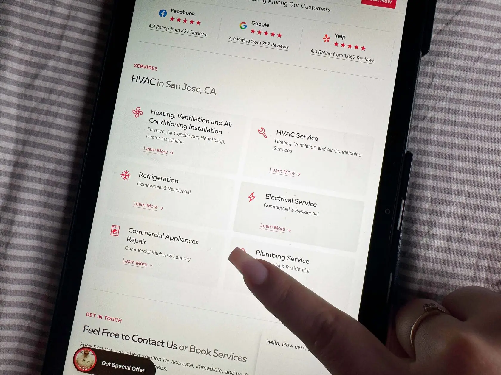 a phone with hvac website opened