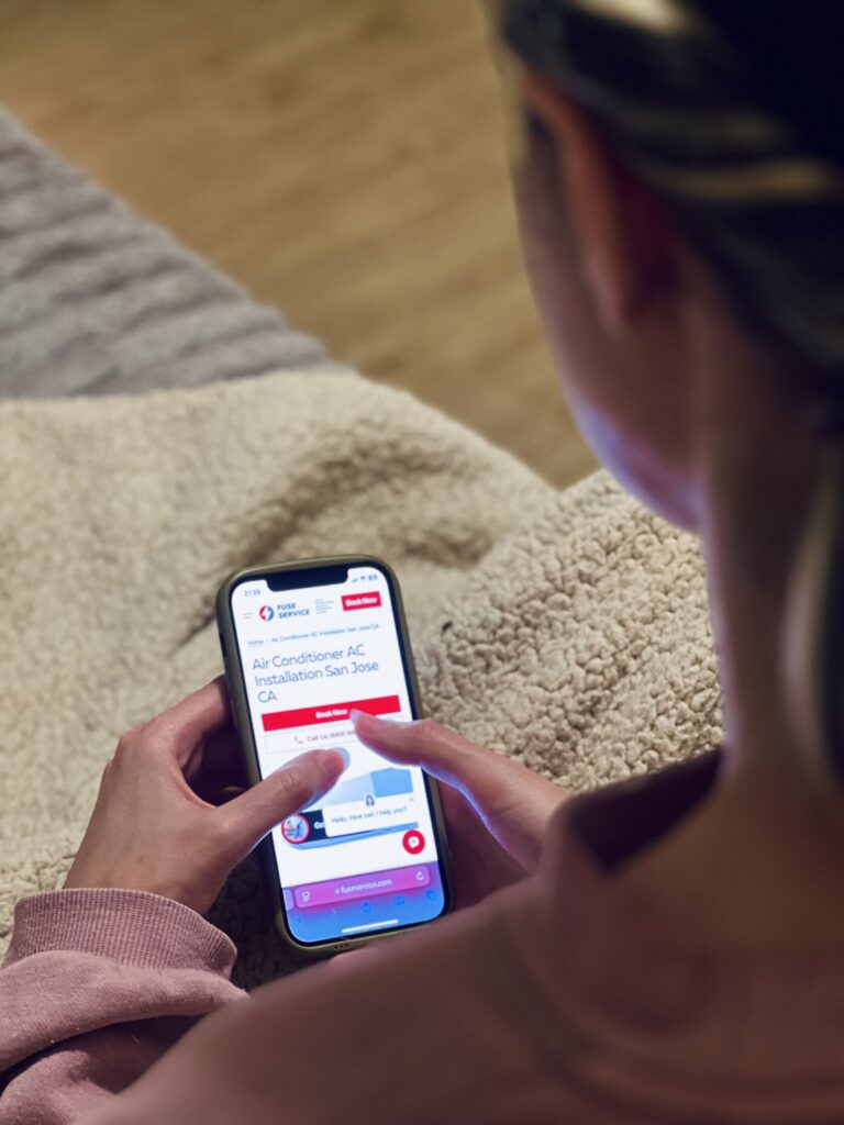 a woman watching a phone